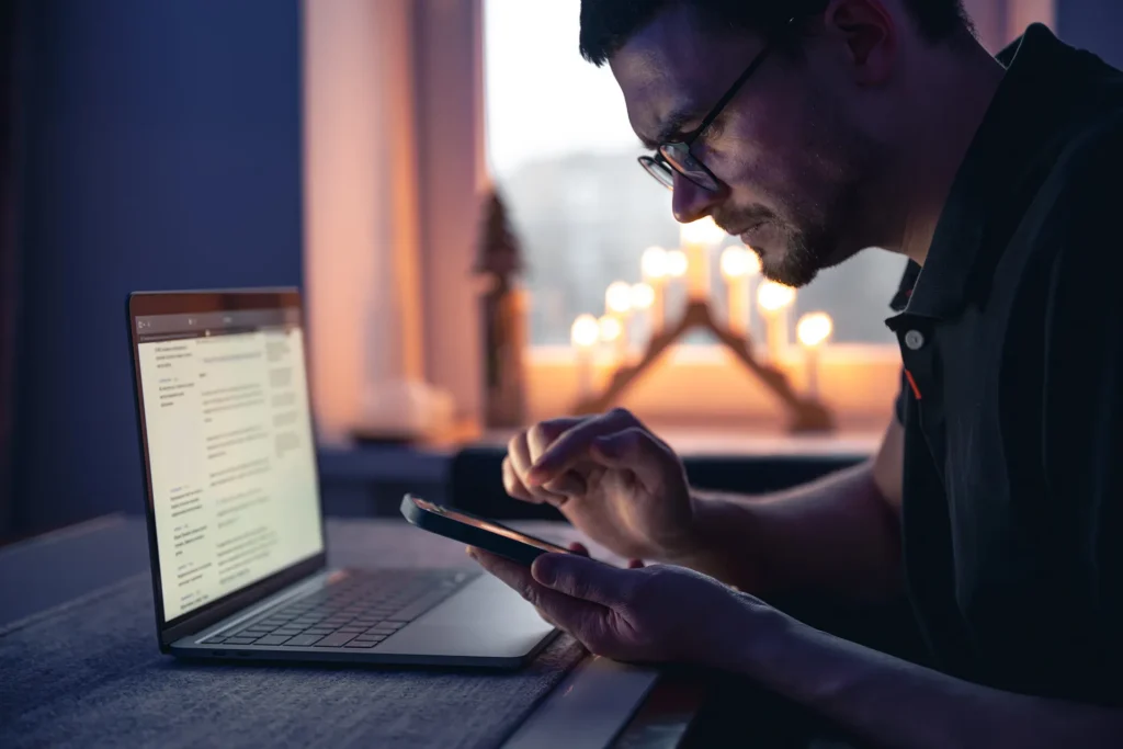 Investor using ChatGPT on a phone to find a financial advisor